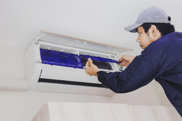 hvac contractor servicing mini split AC